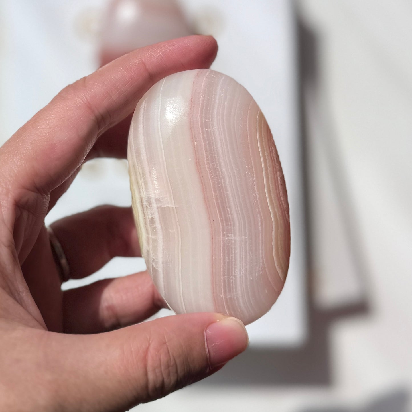 Pink Banded Calcite Palm Stone 粉紅千層方解石
