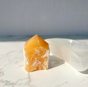Orange Calcite semi-polished point (ORC-002)