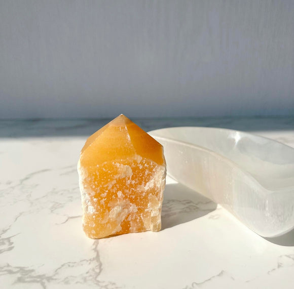 Orange Calcite semi-polished point (ORC-002)